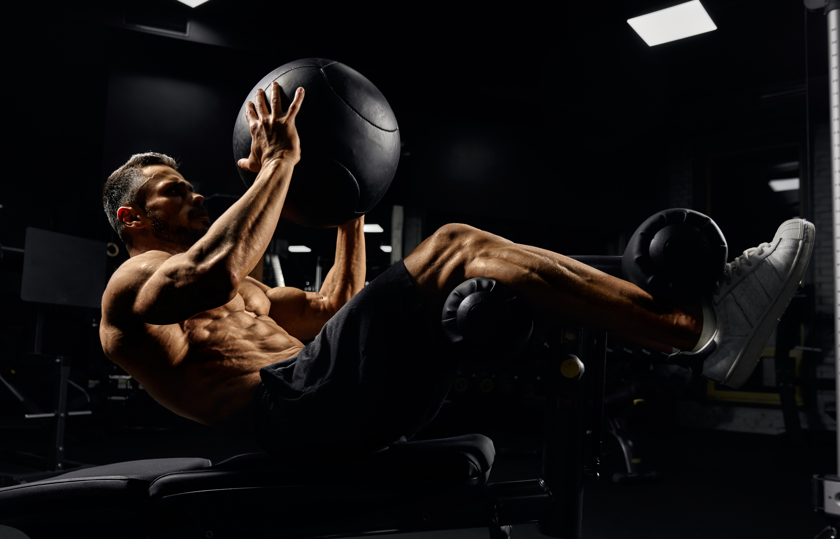 Man Building Core Muscles with Ball.